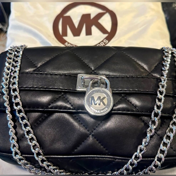 Michael Kors Quilted Black purse Perfect condition. Comes with a dust bag too! - Picture 7 of 7